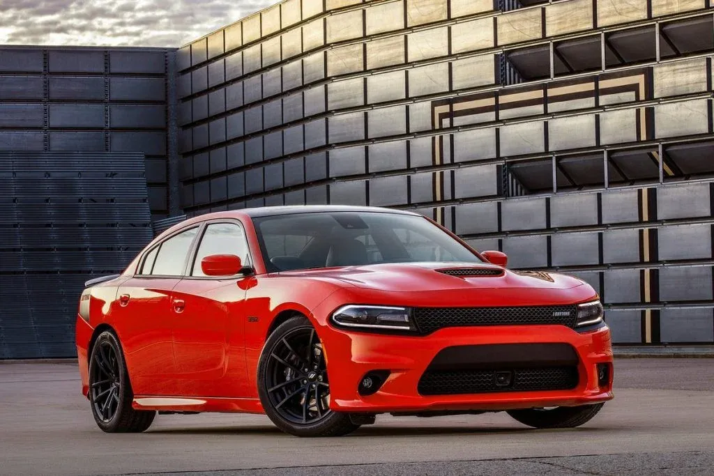 2027 Dodge Charger Super Bee Launch Edition performance coupe in a bright heritage-inspired color on a road