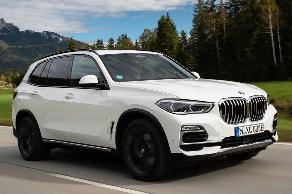 BMW SUV production line at the Spartanburg, South Carolina plant with workers assembling vehicles