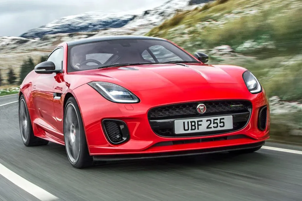 Jaguar Type 01 electric GT interior with four individual seats and a sculptural center console