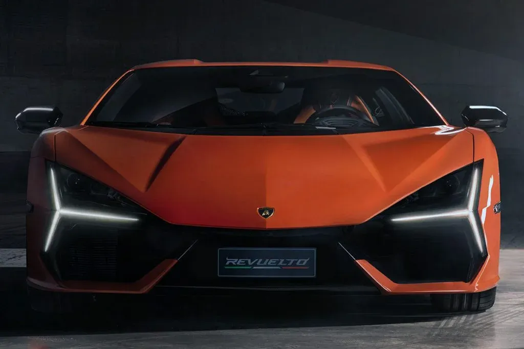 Lamborghini Revuelto Miura 60 Homage in a classic Miura-inspired two-tone paint scheme photographed from the front three-quarter angle